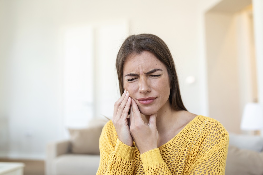 woman suffering from gum diseases